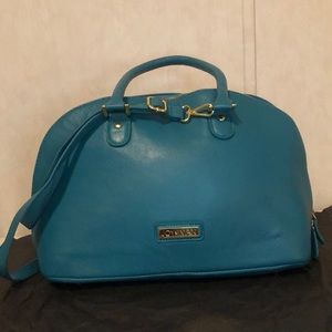 Joy and Iman purse